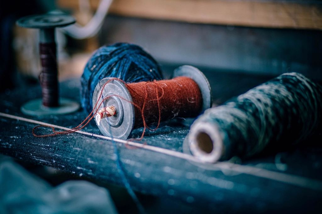 Operator working at an industrial sewing machine