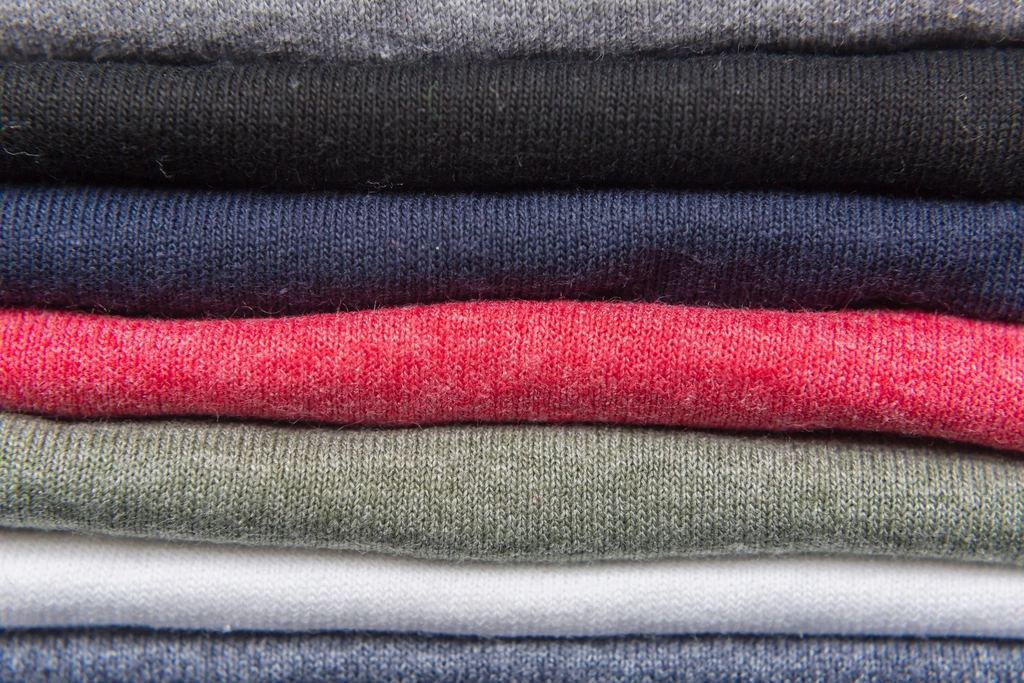 Stack of folded t-shirts